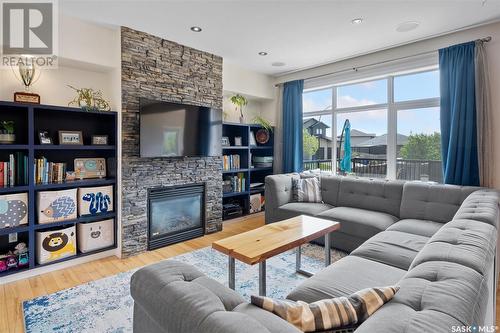 406 Wilkins Crescent, Saskatoon, SK - Indoor Photo Showing Living Room With Fireplace