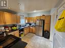 313 G Avenue S, Saskatoon, SK  - Indoor Photo Showing Kitchen With Double Sink 