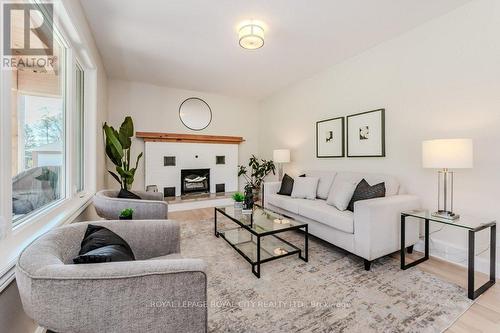 97 Ellenville Crescent, Guelph/Eramosa, ON - Indoor Photo Showing Living Room With Fireplace