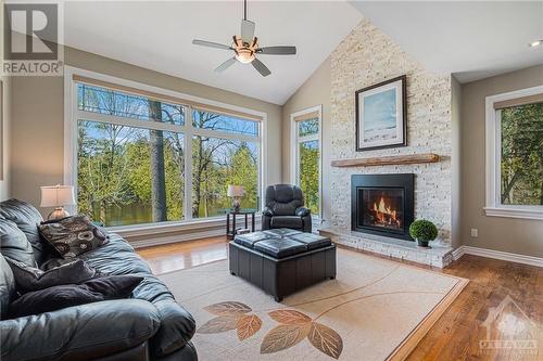 4120 Riverside Drive Unit#K, Ottawa, ON - Indoor Photo Showing Living Room With Fireplace