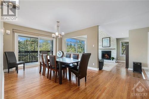 4120 Riverside Drive Unit#K, Ottawa, ON - Indoor Photo Showing Dining Room With Fireplace