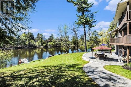 4120 Riverside Drive Unit#K, Ottawa, ON - Outdoor With Body Of Water