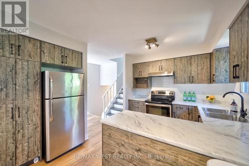 13 Skegby Road N, Brampton, ON - Indoor Photo Showing Kitchen With Double Sink