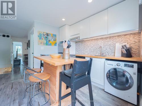 200 Simpson Avenue, Toronto, ON - Indoor Photo Showing Laundry Room