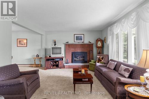 3093 Hwy 26, Springwater, ON - Indoor Photo Showing Living Room With Fireplace