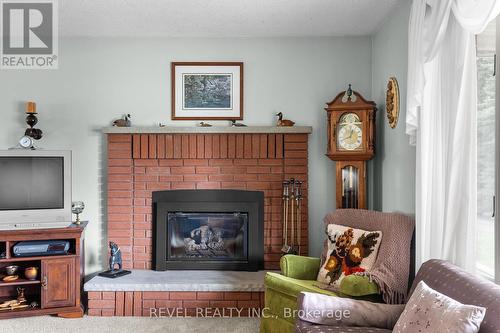 3093 Hwy 26, Springwater, ON - Indoor Photo Showing Living Room With Fireplace