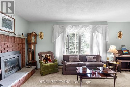 3093 Hwy 26, Springwater, ON - Indoor Photo Showing Living Room With Fireplace