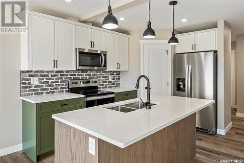 2973 Green Stone Road, Regina, SK - Indoor Photo Showing Kitchen With Double Sink With Upgraded Kitchen