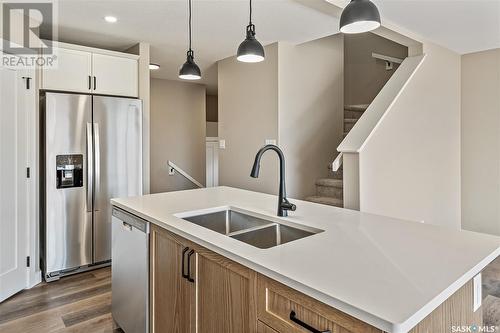 2973 Green Stone Road, Regina, SK - Indoor Photo Showing Kitchen With Double Sink