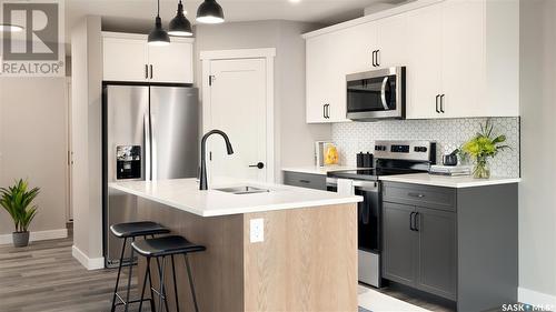 2973 Green Stone Road, Regina, SK - Indoor Photo Showing Kitchen With Double Sink