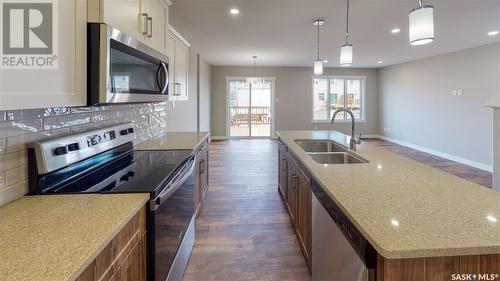 2973 Green Stone Road, Regina, SK - Indoor Photo Showing Kitchen With Double Sink With Upgraded Kitchen