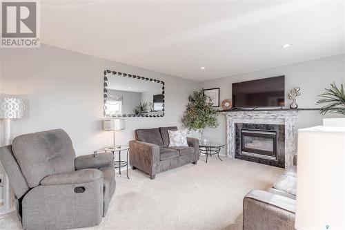 218 Haslam Court, Saskatoon, SK - Indoor Photo Showing Living Room With Fireplace