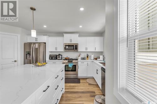 128 315 Dickson Crescent, Saskatoon, SK - Indoor Photo Showing Kitchen With Upgraded Kitchen