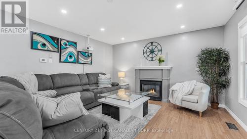 Cozy Livingroom w/ Fireplace - 53 Briscoe Street W, London, ON - Indoor Photo Showing Living Room With Fireplace