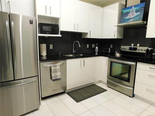 205-1250 Stewart Ave, Nanaimo, BC - Indoor Photo Showing Kitchen With Stainless Steel Kitchen With Upgraded Kitchen