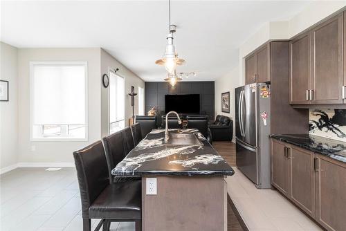 67 Larry Crescent, Caledonia, ON - Indoor Photo Showing Kitchen With Stainless Steel Kitchen With Double Sink