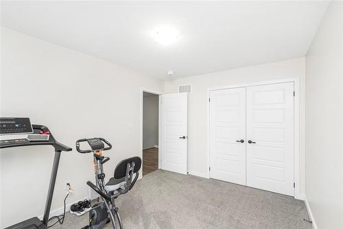 67 Larry Crescent, Caledonia, ON - Indoor Photo Showing Gym Room
