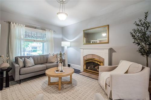 90 Blake Street, Hamilton, ON - Indoor Photo Showing Living Room With Fireplace