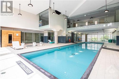 197 Lisgar Street Unit#213, Ottawa, ON - Indoor Photo Showing Other Room With In Ground Pool