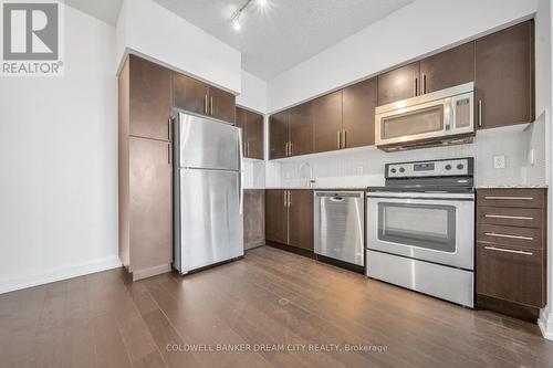 1612 - 65 Speers Road, Oakville, ON - Indoor Photo Showing Kitchen With Stainless Steel Kitchen