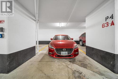 1612 - 65 Speers Road, Oakville, ON - Indoor Photo Showing Garage