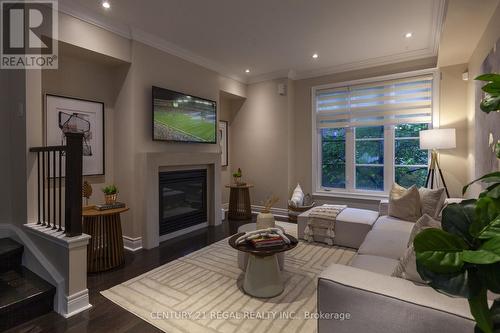 77 - 1812 Burnhamthorpe Road E, Mississauga, ON - Indoor Photo Showing Living Room With Fireplace