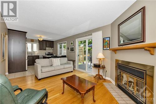 134 Shearer Crescent, Ottawa, ON - Indoor Photo Showing Living Room With Fireplace