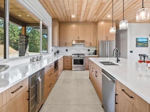 135 Granite Court, Naramata, BC - Indoor Photo Showing Kitchen With Stainless Steel Kitchen With Double Sink With Upgraded Kitchen