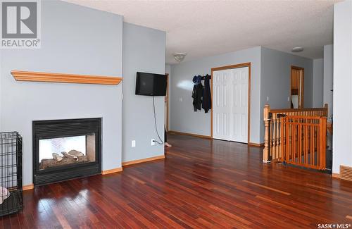 705 Sun Valley Drive, Estevan, SK - Indoor Photo Showing Living Room With Fireplace