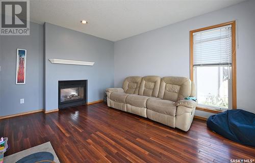 705 Sun Valley Drive, Estevan, SK - Indoor Photo Showing Living Room With Fireplace