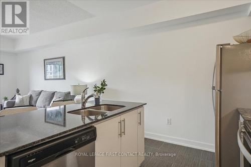 213 - 4 Spice Way, Barrie (Innis-Shore), ON - Indoor Photo Showing Kitchen With Double Sink