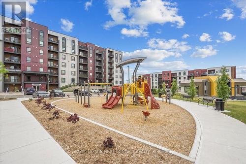 213 - 4 Spice Way, Barrie (Innis-Shore), ON - Outdoor With Balcony With Facade