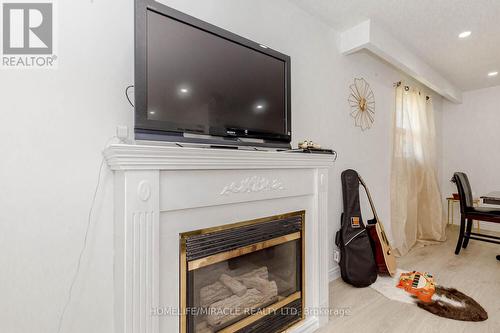 48 Gondola Crescent, Brampton, ON - Indoor Photo Showing Living Room With Fireplace