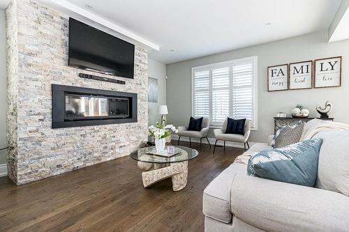 958 Beach Boulevard, Hamilton, ON - Indoor Photo Showing Living Room With Fireplace