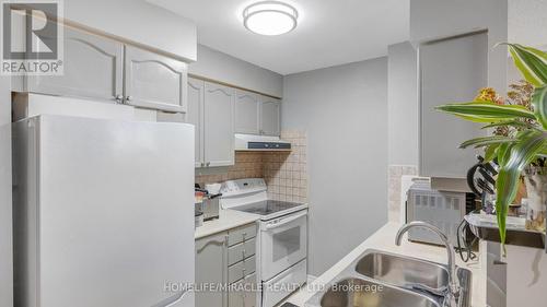 2206A - 710 Humberwood Boulevard, Toronto, ON - Indoor Photo Showing Kitchen With Double Sink