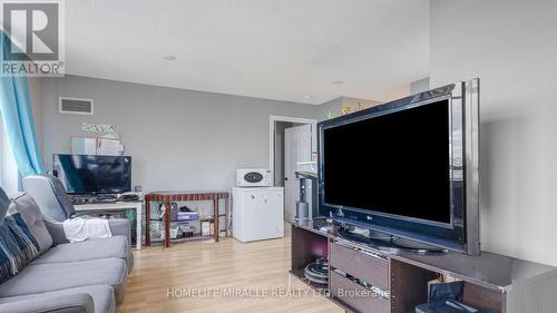 2206A - 710 Humberwood Boulevard, Toronto, ON - Indoor Photo Showing Living Room