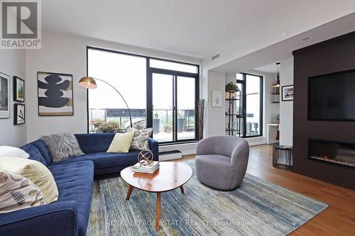 901 - 1100 Kingston Road, Toronto, ON - Indoor Photo Showing Living Room With Fireplace