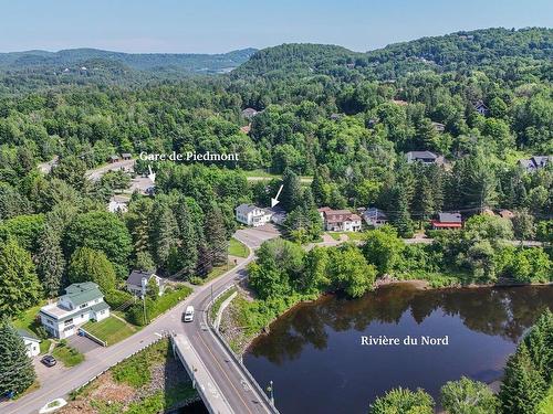 Aerial photo - 136 Ch. De La Gare, Piedmont, QC - Outdoor With Body Of Water With View