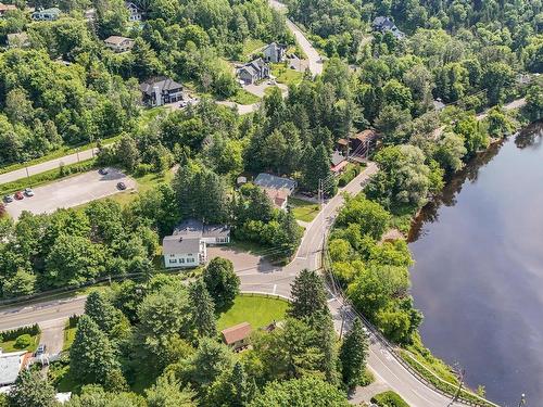 Aerial photo - 136 Ch. De La Gare, Piedmont, QC - Outdoor With Body Of Water With View