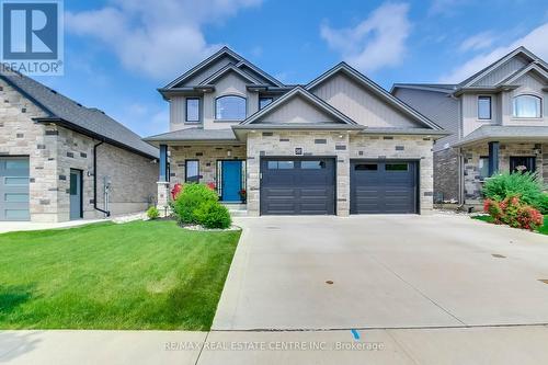 587 Hawthorne Place, Woodstock, ON - Outdoor With Facade