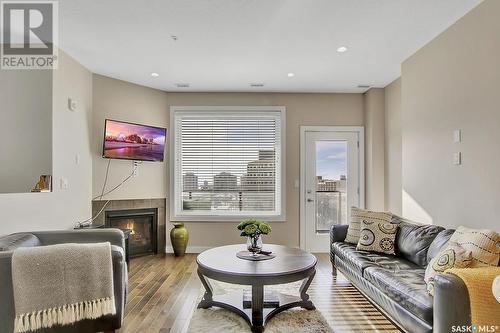 707 2055 Rose Street, Regina, SK - Indoor Photo Showing Living Room With Fireplace