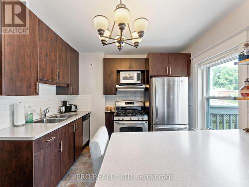 1178 Gerrard Street E, Toronto, ON - Indoor Photo Showing Kitchen With Double Sink