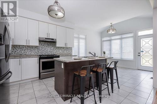71 Michaelis Street, New Tecumseth, ON - Indoor Photo Showing Kitchen With Upgraded Kitchen