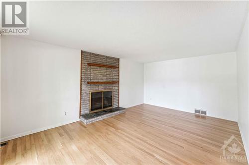 89 Beaver Ridge, Ottawa, ON - Indoor Photo Showing Living Room With Fireplace