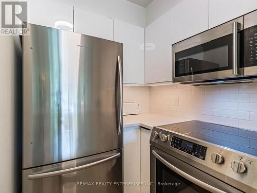 205 - 9 Michael Power Place, Toronto, ON - Indoor Photo Showing Kitchen With Stainless Steel Kitchen