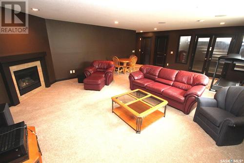 4647 Ellard Court, Regina, SK - Indoor Photo Showing Living Room With Fireplace