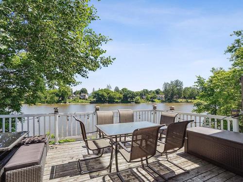 Patio - 320 Rue Notre-Dame, Charlemagne, QC - Outdoor With Body Of Water With Deck Patio Veranda