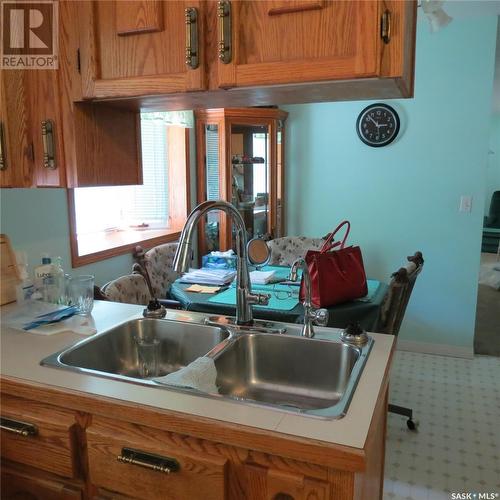 58 Hammond Road, Regina, SK - Indoor Photo Showing Kitchen With Double Sink