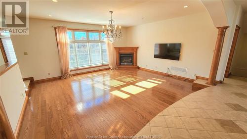 380 Shoreview Circle, Windsor, ON - Indoor Photo Showing Living Room With Fireplace