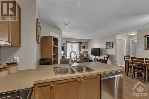 Perfect for entertaining. - 151 Potts Private Unit#311, Ottawa, ON - Indoor Photo Showing Kitchen With Double Sink